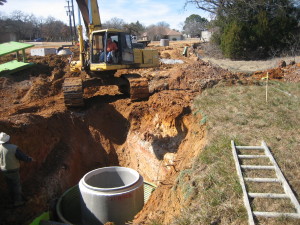 Sewer manhole installed at Steeplechase South, Hickory Creek, TX 