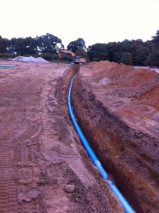 Laying the water line for 57 lot subdivision